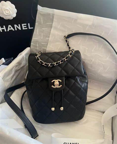 chanel 23s backpack|Chanel black and white handbags.